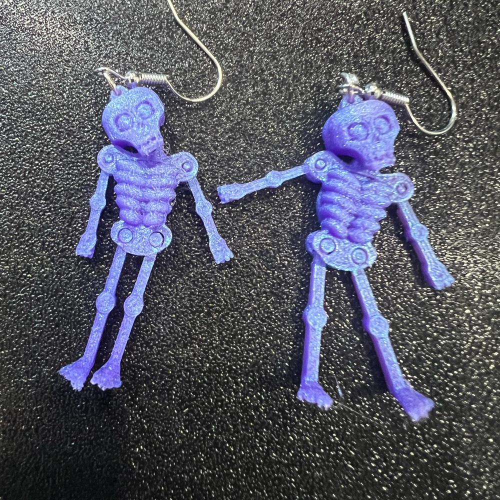 Purple skeleton earrings 3d printed